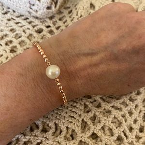 Rose gold tone bead and pearl coil bracelet